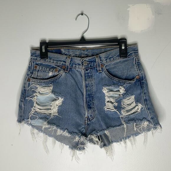 LEVI’S Cut Off Medium Wash Distressed Denim Shorts Size Medium - Picture 1 of 7